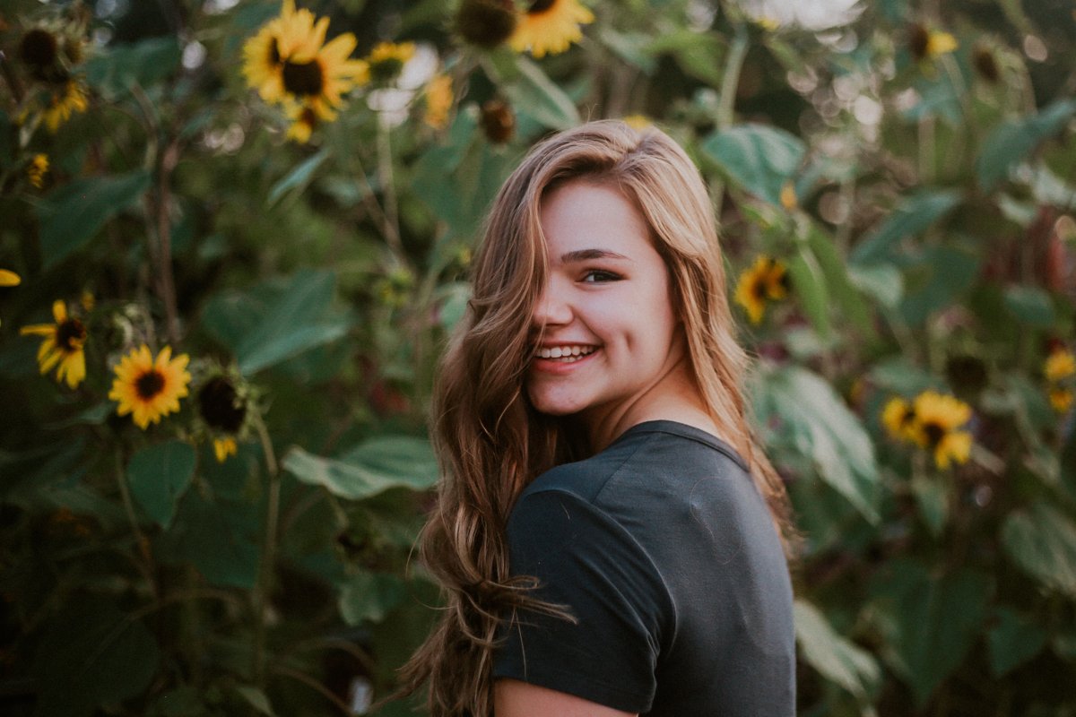 Maddy with sunflowers